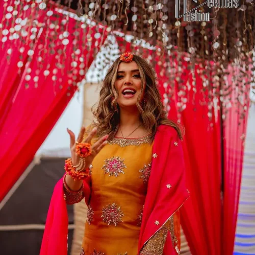 We seek outside the wonders we carry inside us. A mehndi dress in the mustard shirt is enhanced with gorgeous