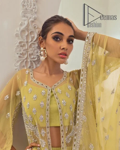 The love we share will make her mehndi day super duper amazing. This mehndi wears an olive front open shirt