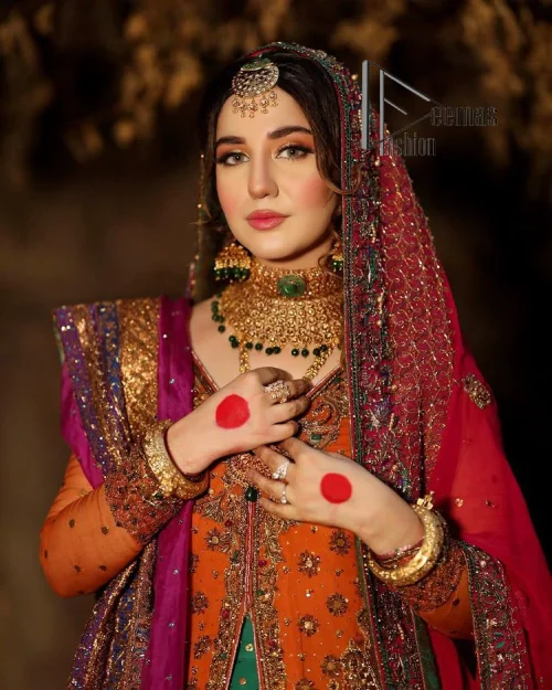 A colourful mehndi outfit is a power which directly influences the soul. Begin this mehndi outfit with a rusted front