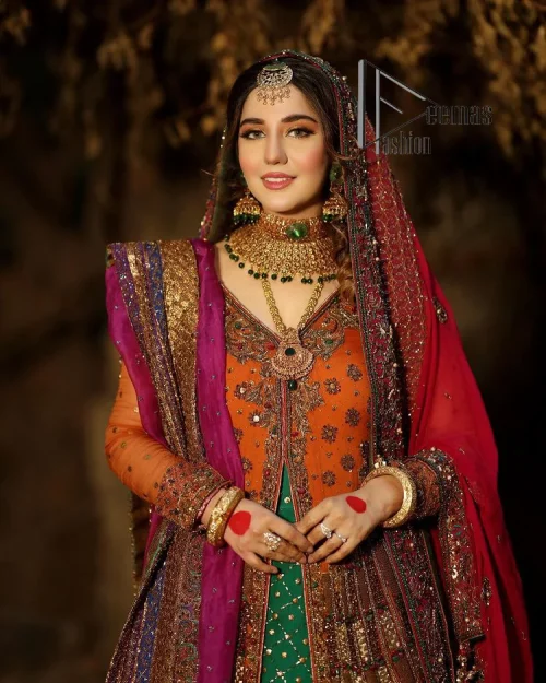 A colourful mehndi outfit is a power which directly influences the soul. Begin this mehndi outfit with a rusted front