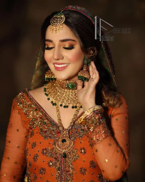 A colourful mehndi outfit is a power which directly influences the soul. Begin this mehndi outfit with a rusted front