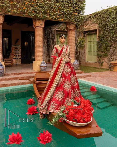 Nothing beats the luxury of bright red couture in reception. Our luxury bright red blouse is entirely hand-worked and finished