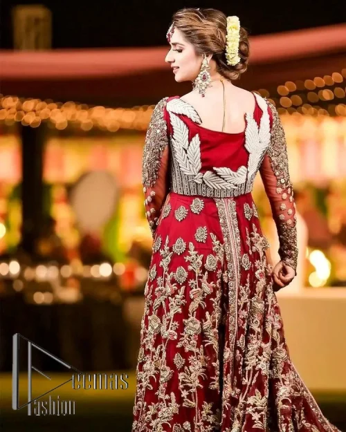 The magic of luxurious romantic silhouettes, giving out love and letting it come in. A maroon frilled maxi that is