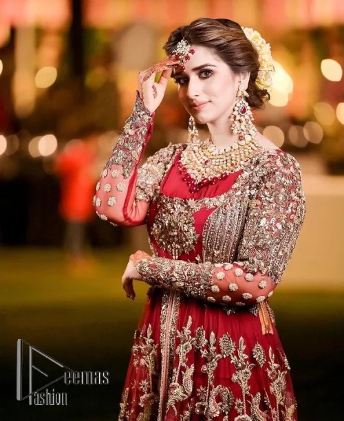 The magic of luxurious romantic silhouettes, giving out love and letting it come in. A maroon frilled maxi that is