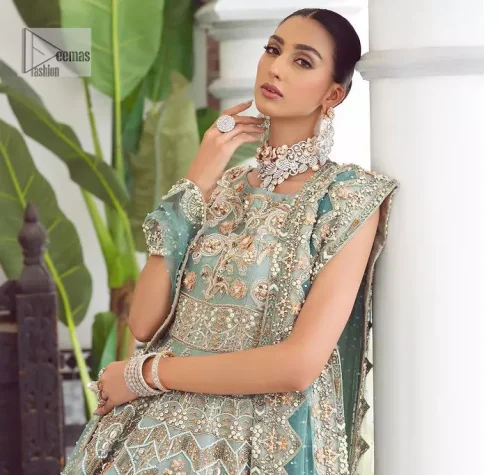 Be a fashion diva in this true modern classic Nikah outfit! The pale blue pleated maxi is handsomely adorned with
