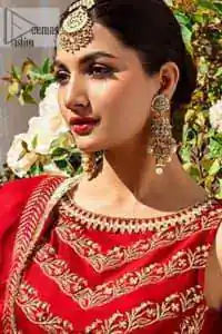 Master of artists who are the secret keepers of the canvas made the perfect shade of red for you to wear at your reception. A pure organza canvas of blouse, dipped in the richest shade of red, is adorned with dabka, sequins, tilla, kora and the magic of Resham. The following blouse is further magnified with golden embroidery with the highest attention to detail. The Round shape neckline of the blouse gives so romantic look when comes with a sleeveless style. It is paired u with flared and fluffy lehenga in silk whose bottom is heavily embellished. Complete this outfit with an organza dupatta framed with four-sided borders to be the star of the show.