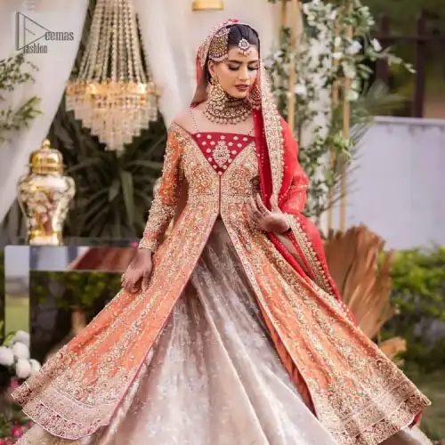 Shine bright in the sparkling ensemble from DeemasFashion. Introducing this reception outfit which begins with a rust pishwas. This front