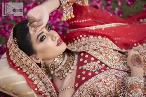 Shine bright in the sparkling ensemble from DeemasFashion. Introducing this reception outfit which begins with a rust pishwas. This front