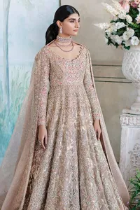 Make your Nikah look pop with the unique pieces from DeemasFashion. This pishwas is hand-embellished with multiple colour embroidery and lavish designs. Pearls, tilla, dabka, kora, zardozi and sequins give a glamorous touch to this Pishwas. The V neckline of the following pishwas archives a finished look. Further, the full sleeves balance the look of the outfit to make your day charming and beautiful. It is coordinated with floor length lehenga and is also embellished to make this stunning attire a breathtaking choice to wear on the most important day of your life. Finish this with a dupatta framed with four-sided borders and sequins sprayed all over.