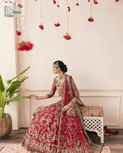 This outfit is a stand-out look for the Pakistani reception, this ensemble consists of a bright red-hued lehenga choli. This