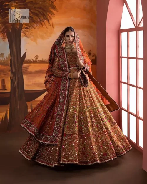 Blissful rust! This ensemble is the epitome of grace. DeemasFashion presents this beautiful mehndi outfit in rust colour to make
