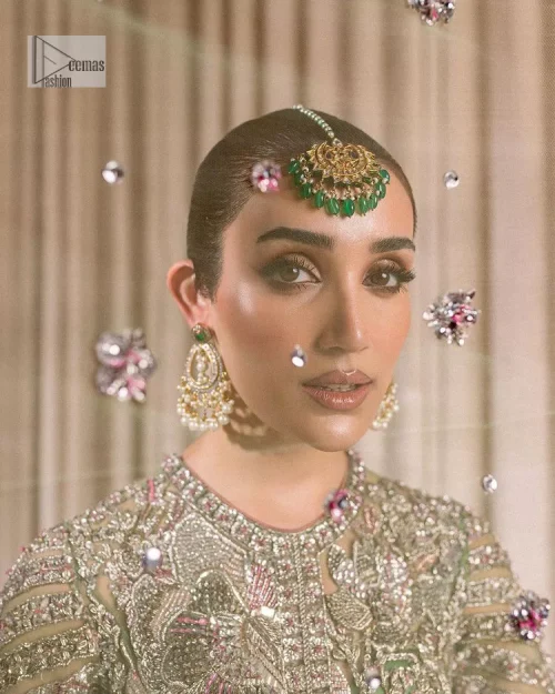 Dive into the world of ultimate allurement with this exquisitely embellished Mehndi outfit that depicts intricate glam with an elegant