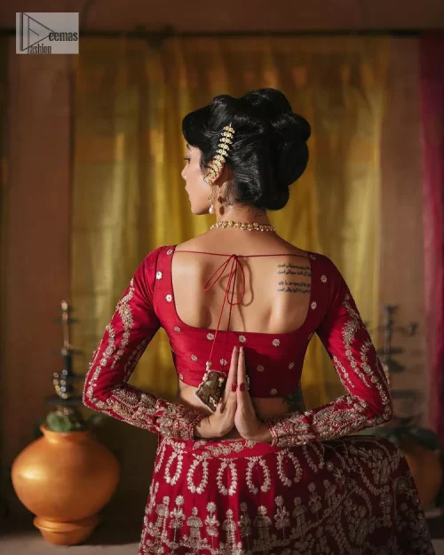 We are Introducing a wine red blouse and lehenga to our wide range of charming bridal dresses. The Pakistani reception
