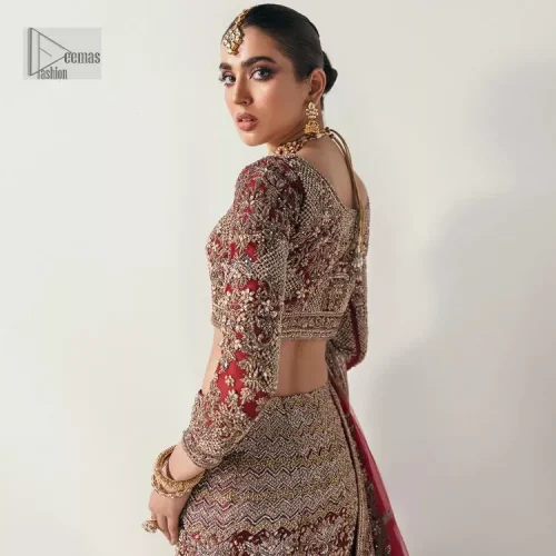 Walk with style at your reception and let the people follow! A stunning wine red blouse is embellished with intricate