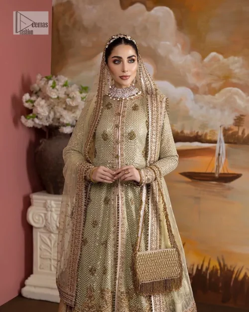 It's where words are not necessary – the outfit does all the talking! A beautiful designed pale green long shirt