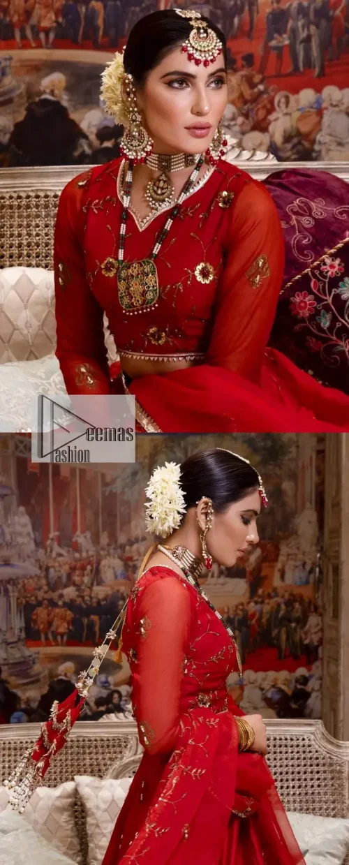 Statement suiting in red. This red blouse comes with a lehenga and dupatta in premium fabric quality. The blouse is