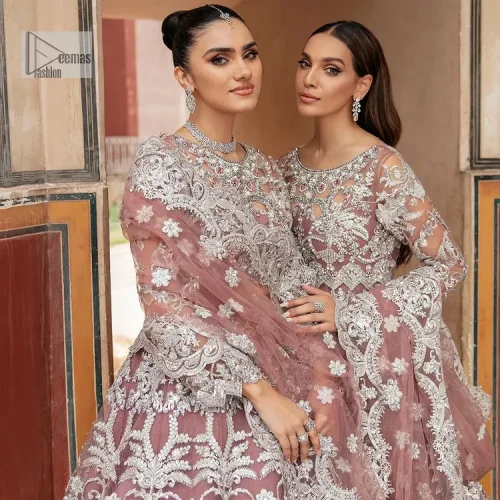 It’s regal, it’s rich, it’s festive. This magnificent nikah outfit is hand-embellished with luxury designs and beautiful silverwork which is