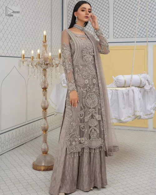 Chill vibes in grey are very rare. A beautiful grey shirt with a medley of hand-embellished floral motifs and floral