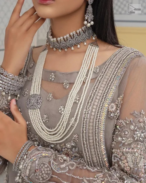 Chill vibes in grey are very rare. A beautiful grey shirt with a medley of hand-embellished floral motifs and floral