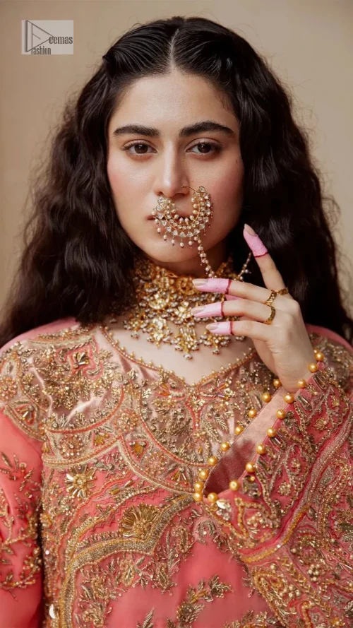 It's an aesthetic kinda mood. The long shirt in the wondrous peach colour is composed of ethnic handworked details and