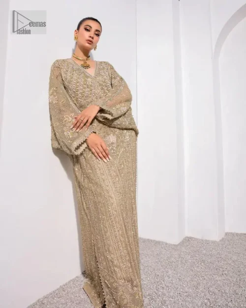 A little classy, a little sassy – that’s your style! An ivory floor-length kaftan with hand embellished work using dabka,