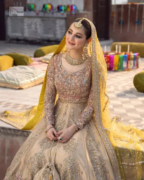 Illuminate your Mehndi ceremony with our stunning tea rose Mehndi outfit, a vibrant celebration of color and design.