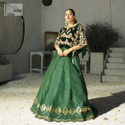 Style. Warmth. Performance & versatility!  This stuns in a beautifully handcrafted green top enshrined with light golden embellishment and detailed