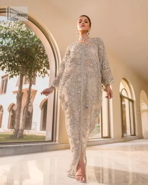 Embrace the essence of your Walima celebration with this exceptional outfit that is coordinated with capri pants and a blouse,