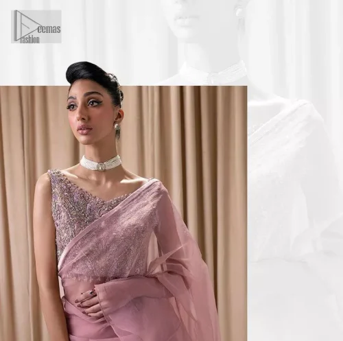 Turn heads in our stunning bridesmaid saree! The beautiful tea pink blouse is adorned with silver and golden embroidery which