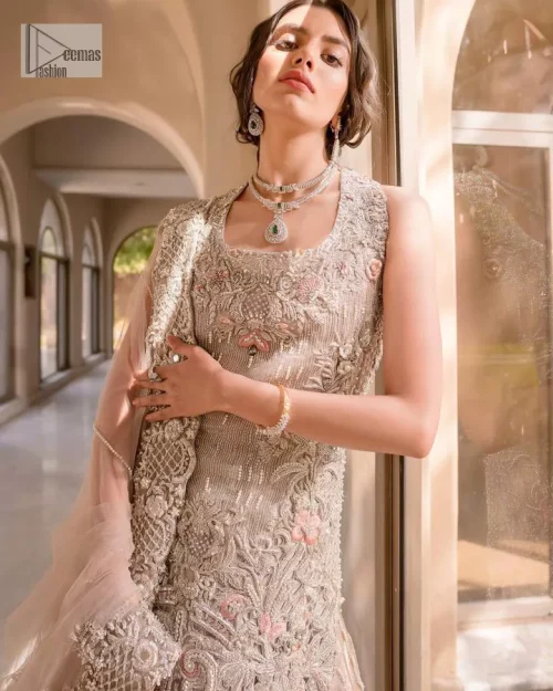 The beauty of idealism is captured with a touch of sparkle. This exclusive rose pink ensemble is beautifully translated on