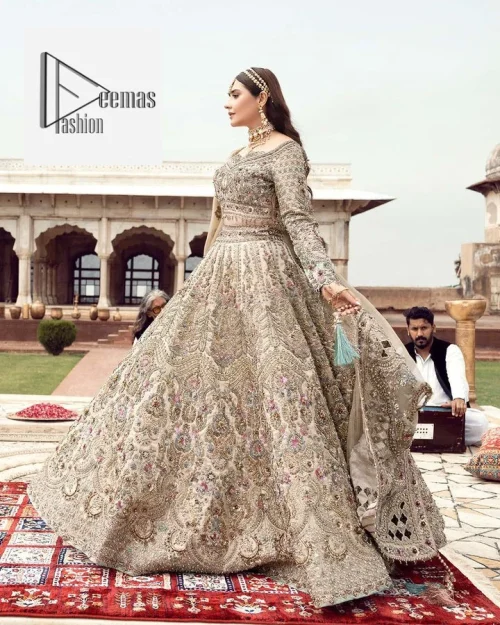 The beautiful floral patterns of this walima wear for versatile you! The?blouse is intricately emblazoned with multiple colour embellishments. Beautiful