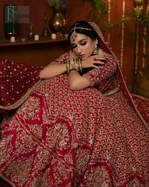 Stand out at your reception in a very special maroon outfit.