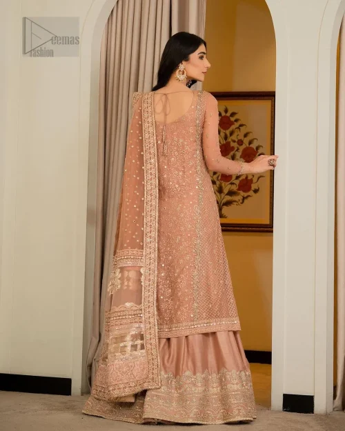 With its bordered embellished sharara made from premium materials, this Nikah dress ensures both comfort and style, allowing you to