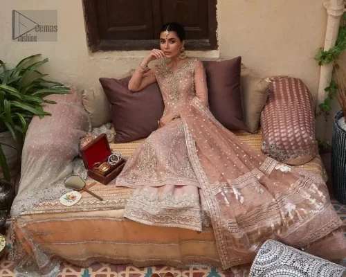 With its bordered embellished sharara made from premium materials, this Nikah dress ensures both comfort and style, allowing you to