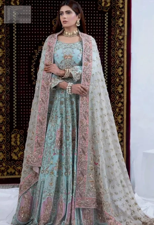 complementing the ethereal ivory elegantly designed dupatta with a pink appliqued border and scattered tiny floral motifs all over the