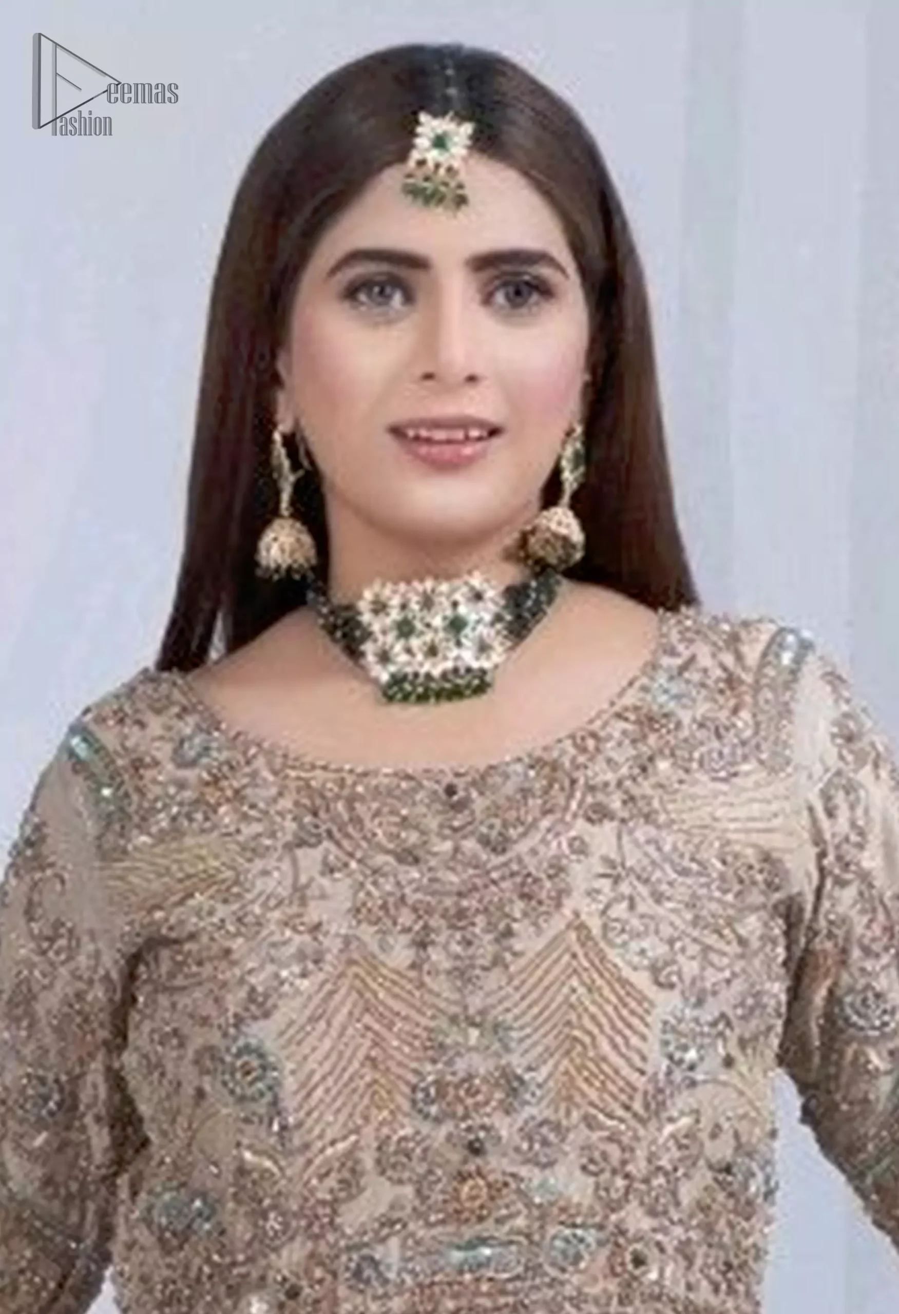 The round neckline and full sleeves offer a refined, classic appeal, while the subtle scalloped edges of the mint green dupatta bring a fresh, ethereal touch.