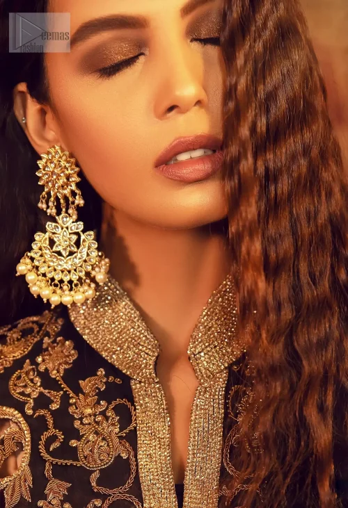 This ensemble exudes confidence and elegance paired with an inner shirt and trousers.