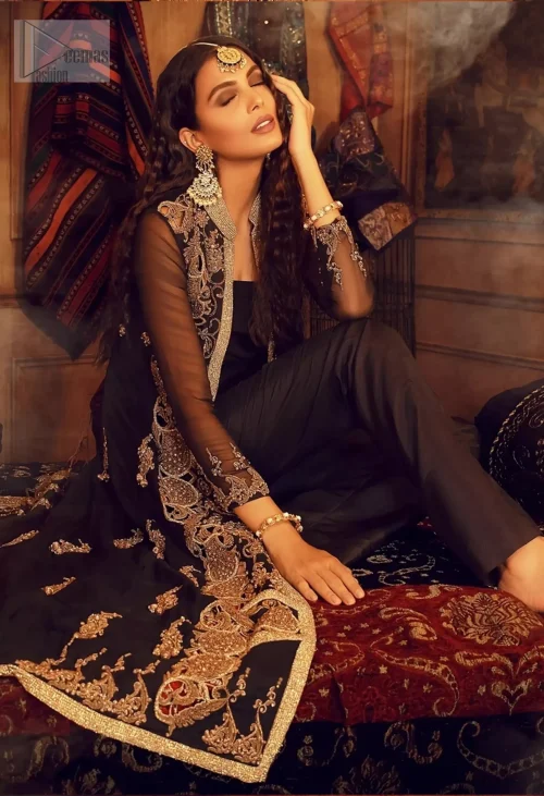 The jacket's collar, neck and open front design add a modern touch, while the antique embroidery and golden threadwork enhance