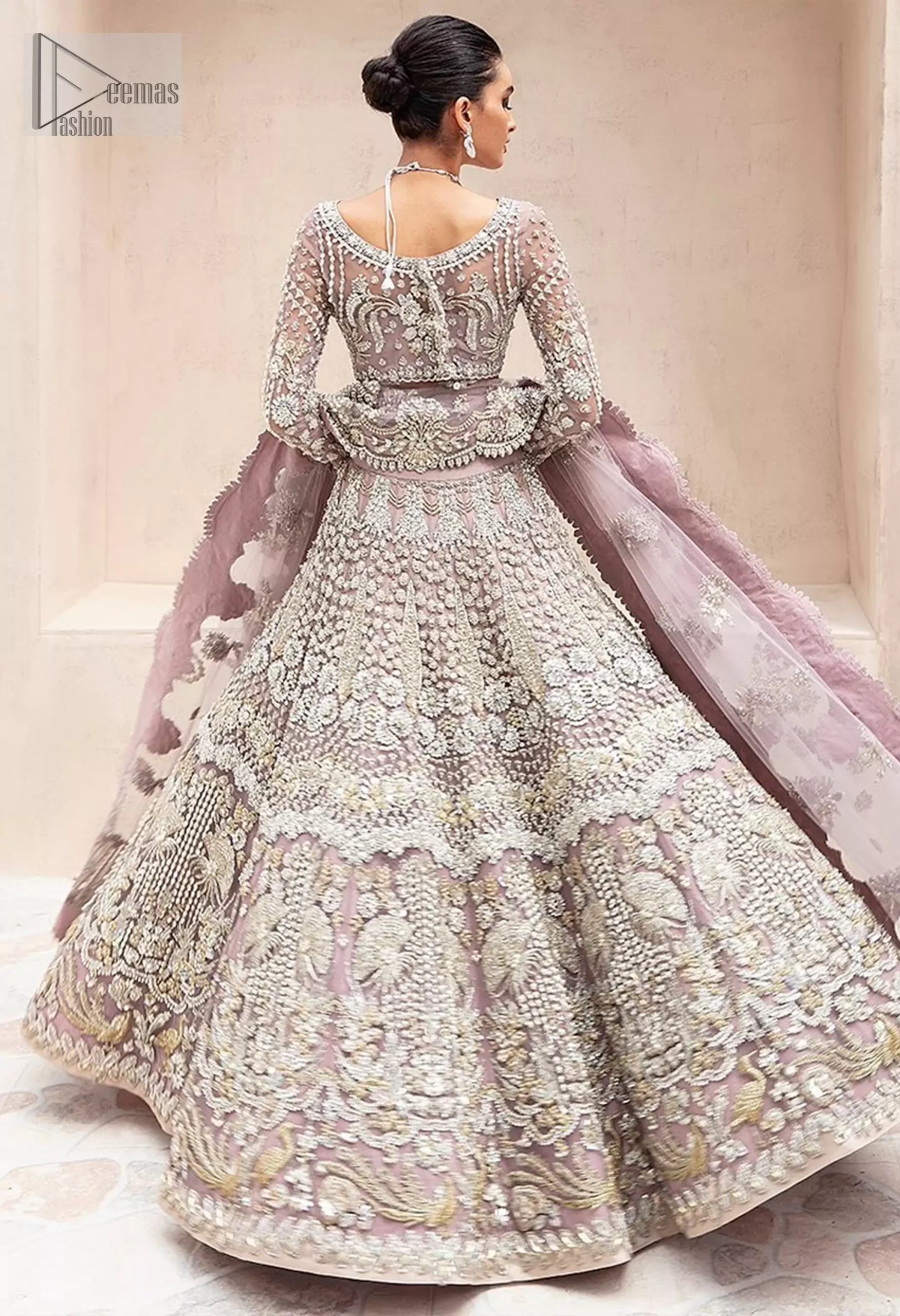 The ensemble is adorned with a silver and light golden embroidery blend, creating a magical interplay of shimmer and softness.