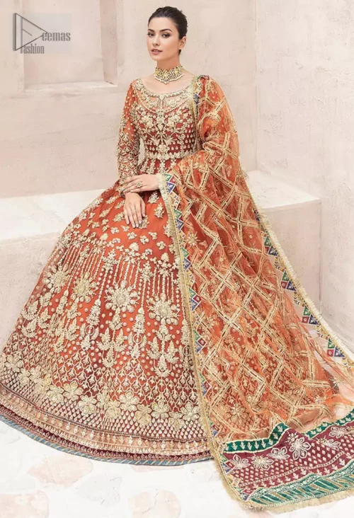 The flowing pishwas silhouette, adorned with floral patterns, adds a touch of traditional artistry, while the illusion neckline brings a