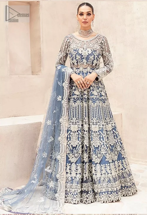 Crafted from flowing organza, this ensemble captures the essence of timeless beauty, making it the perfect choice for a bride