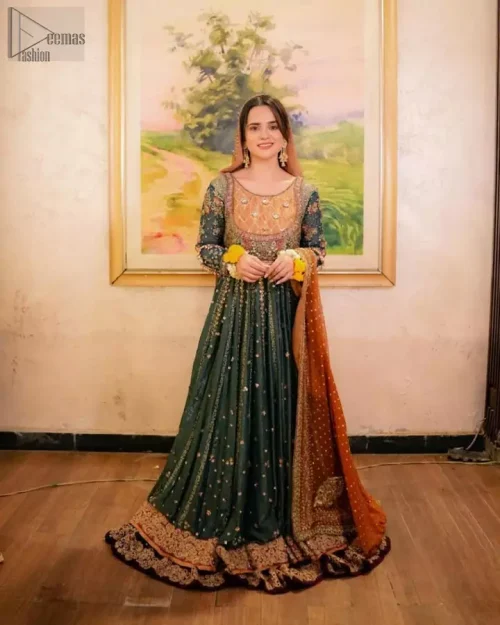 Bottle green maxi shirt paired with an indigo lehenga and rust dupatta for a vibrant mehndi event.