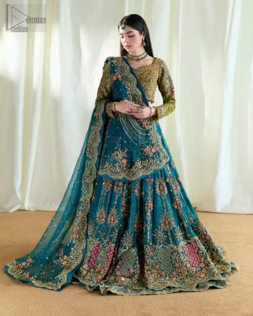 Full sleeves with scalloped cuffs and multicolour thread work on olive blouse.