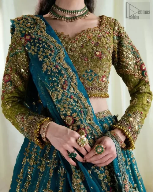 Hand embroidery featuring dabka, stones, pearls, and Swarovski crystals.