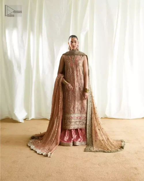 Round notched neckline with golden thread work on peach tissue silk shirt.
