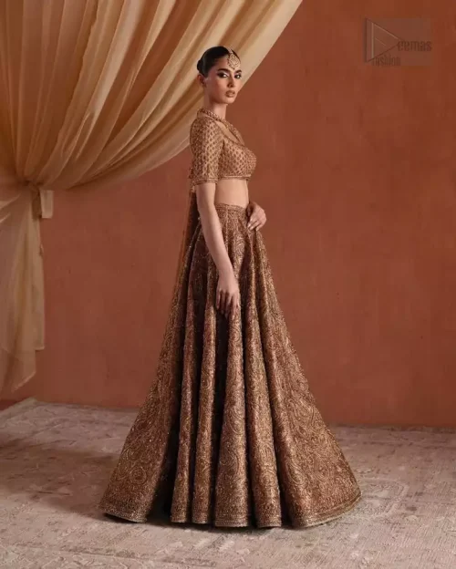 Pure raw silk fabric texture and fine thread work on bronze blouse.
