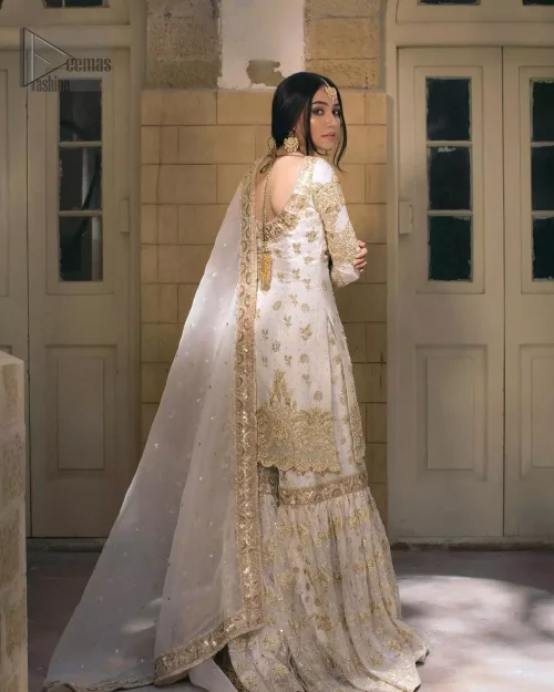Tailored full sleeves and pure raw silk fabric texture on ivory Nikkah shirt.