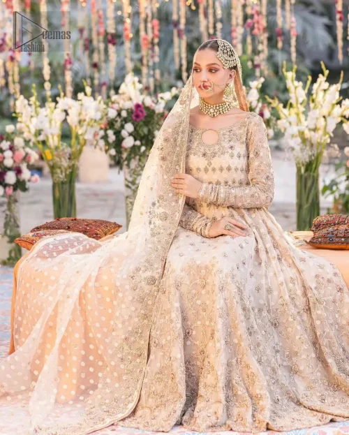 Wide flare hemline and panel construction of ivory kundan zari pishwas.