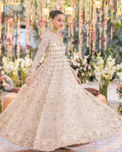 Ivory kundan zari wide-flare pishwas styled for a sacred Nikah ceremony.