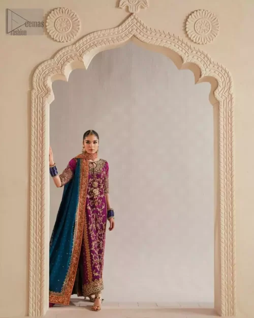 Rust appliqué side panels and fine gota work on magenta net long shirt.